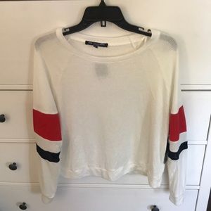 White lightweight sweater with colored details